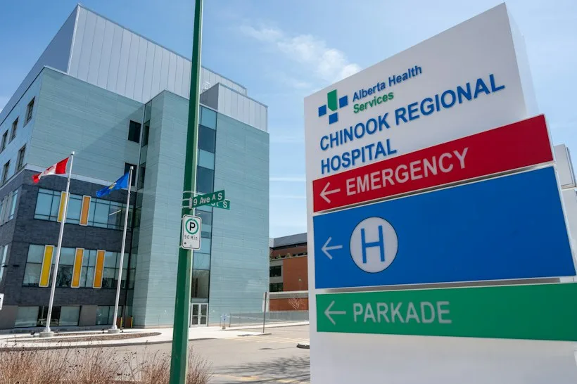 Nurse checking in with a patient receiving acute hospital-level care at home, representing hospital-at-home billing