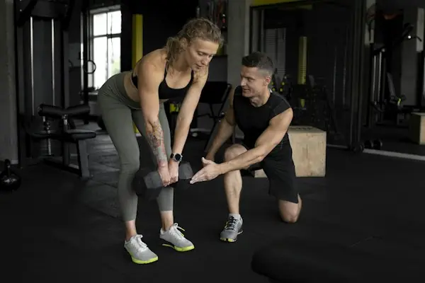 Sports medicine physician evaluating an athlete during a return-to-play assessment in 2026