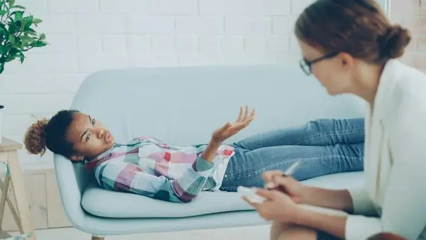 Therapist listening to a patient during a collaborative care behavioral health session