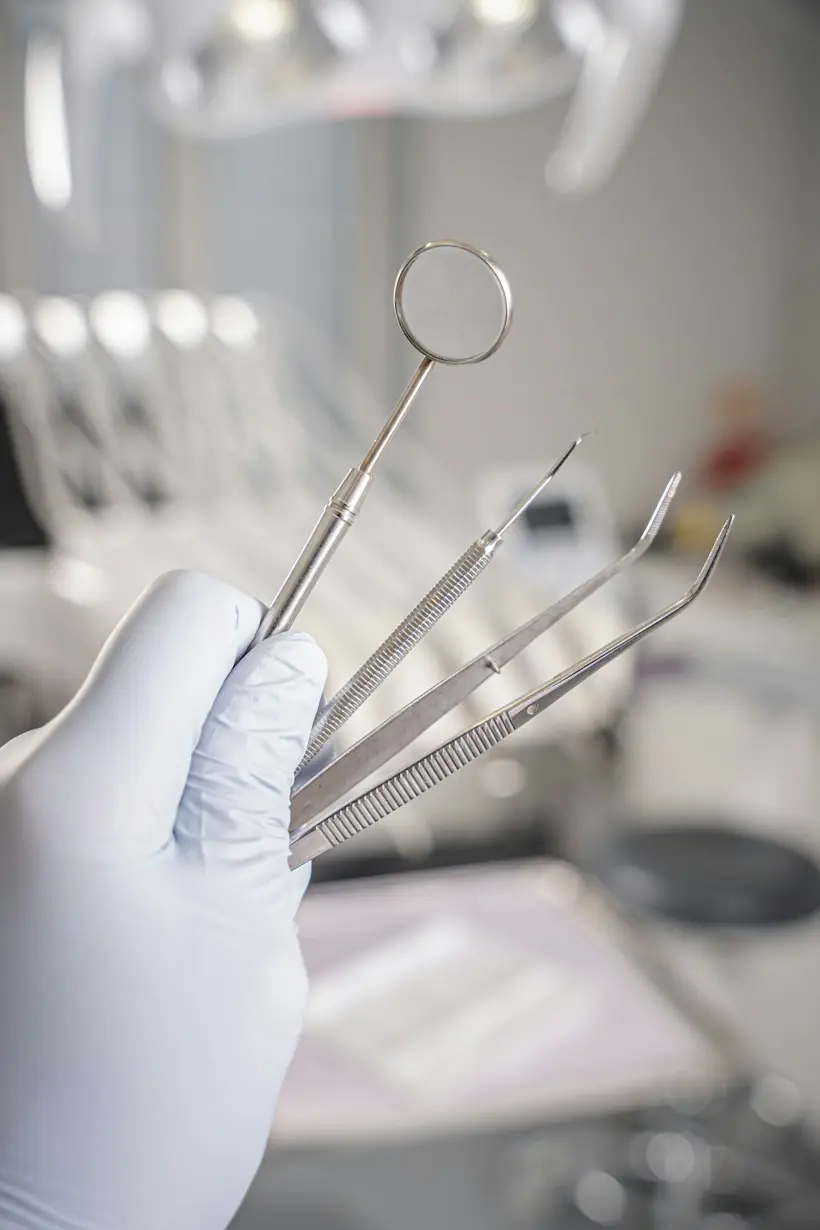 Oral surgeon reviewing dental-medical cross-coding documentation for medical insurance billing 2026